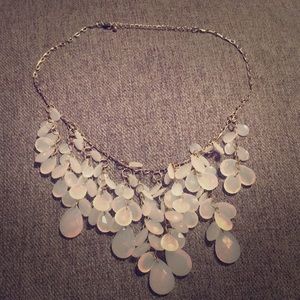 Necklace that dangles with opaque teardrops